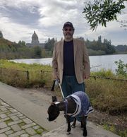 Olympia Computer CEO Erik Johnson with his dog Oly at Capitol Lake in Olympia