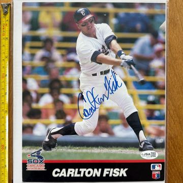 Autographed Carlton Fisk baseball card in action.