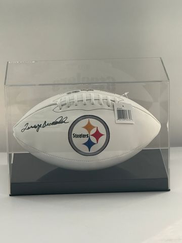 Signed Steelers football in display case.
