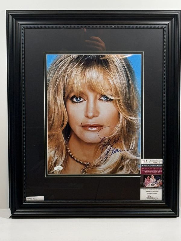 Framed autographed photo of Goldie Hawn.