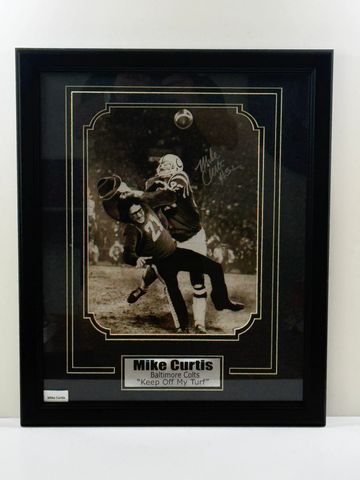 Framed signed photo of Mike Curtis in Baltimore Colts football action.