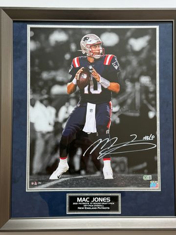Framed signed photo of Mac Jones in Patriots uniform.