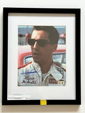 Framed signed photo of Mario Andretti, race car driver.