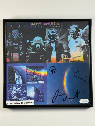 Framed Coldplay album cover with band signatures.