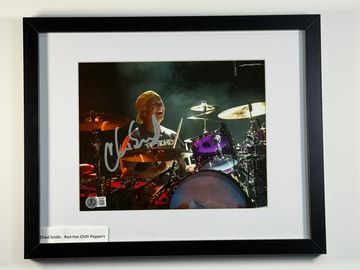 Framed signed photo of drummer Chad Smith playing with Red Hot Chili Peppers.