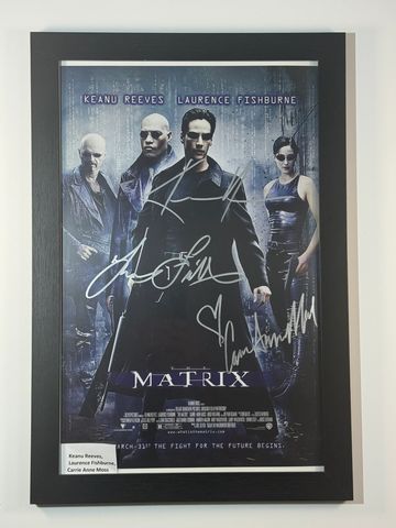 Framed signed poster of the movie Matrix.