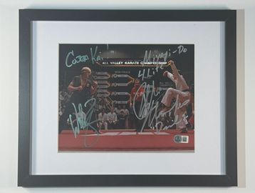 Autographed Karate Kid scene poster featuring tournament bracket.