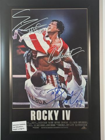 Framed Rocky IV poster signed by cast members.