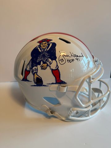 Autographed football helmet with patriotic logo and signature.