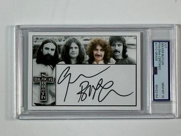 Black Sabbath autographed card in protective case.