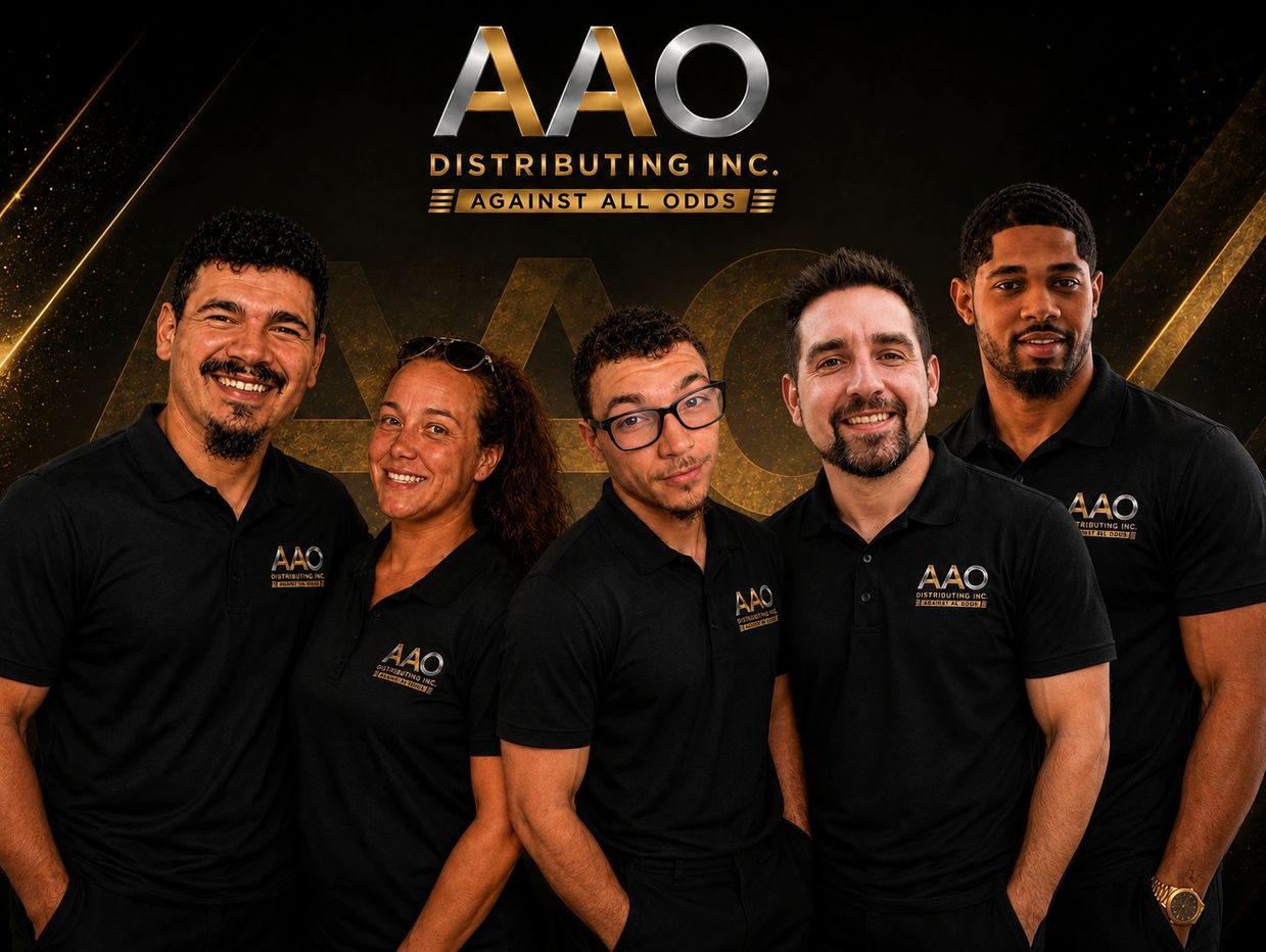 AAO Distributing Inc. team smiling for a group photo.