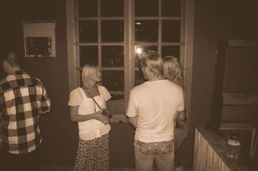 Country Artist Phil Vassar takes a moment with fans to sign autographs and pose for photographs.