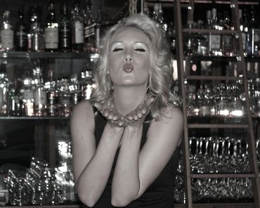 Blowing kisses in the lounge, Folsom, California by Sapphire Romance Photography.