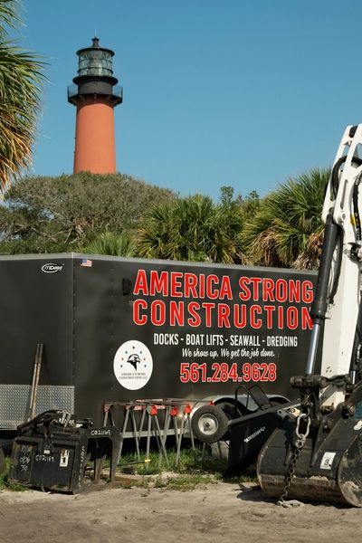 Jupiter Inlet Lighthouse and America Strong Construction marine contractor truck in Jupiter, Florida
