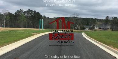 Newly paved residential street ready for home construction in Temple, GA.