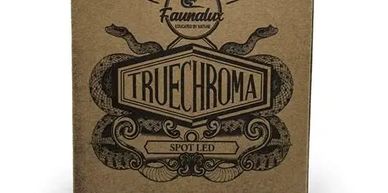 Vintage style TrueChroma product packaging with snake illustration.