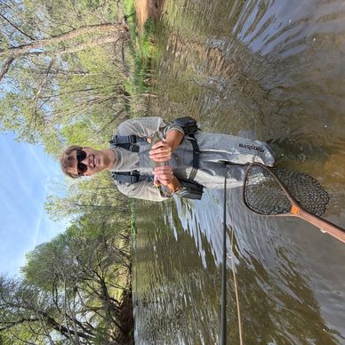 Calm waters in the outdoors for fishing.