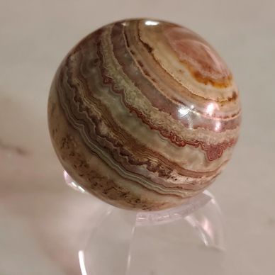 A polished rock sphere