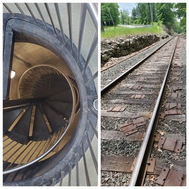 Ornate spiral staircase on left half of picture, rusty train tracks on right