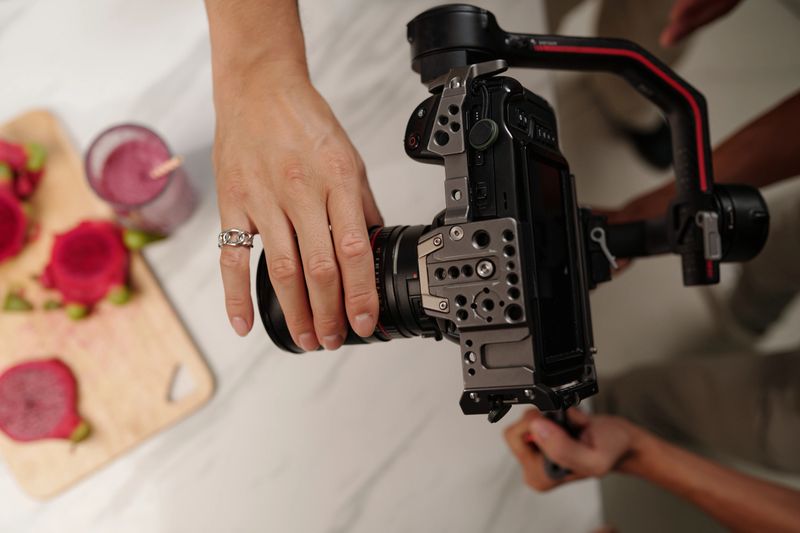 hand-holding-camera-over-fruit-platter-and-smo.jpg