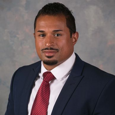 Professional man in suit and red tie.