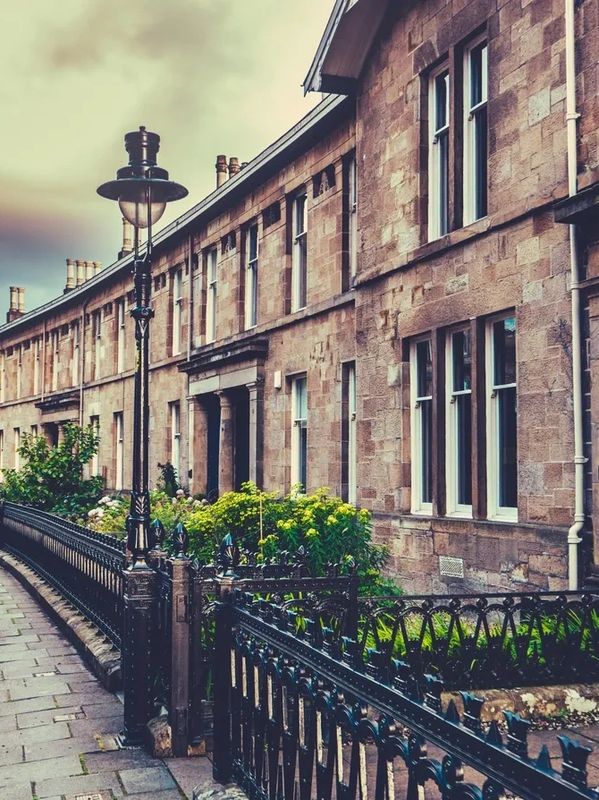 Street view of traditional stone terrace houses.