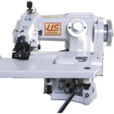 Industrial sewing machine with a white body and digital display.