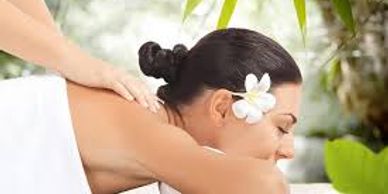 Woman getting massage at spa