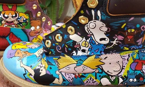 Freehand painted boots of 90's cartoon characters by Eric Dryer