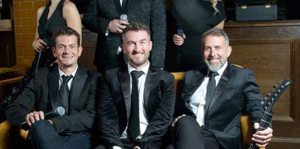 The Minogue Brothers at Blushing Brides Glasgow Wedding Show playing in the live wedding band showcase.