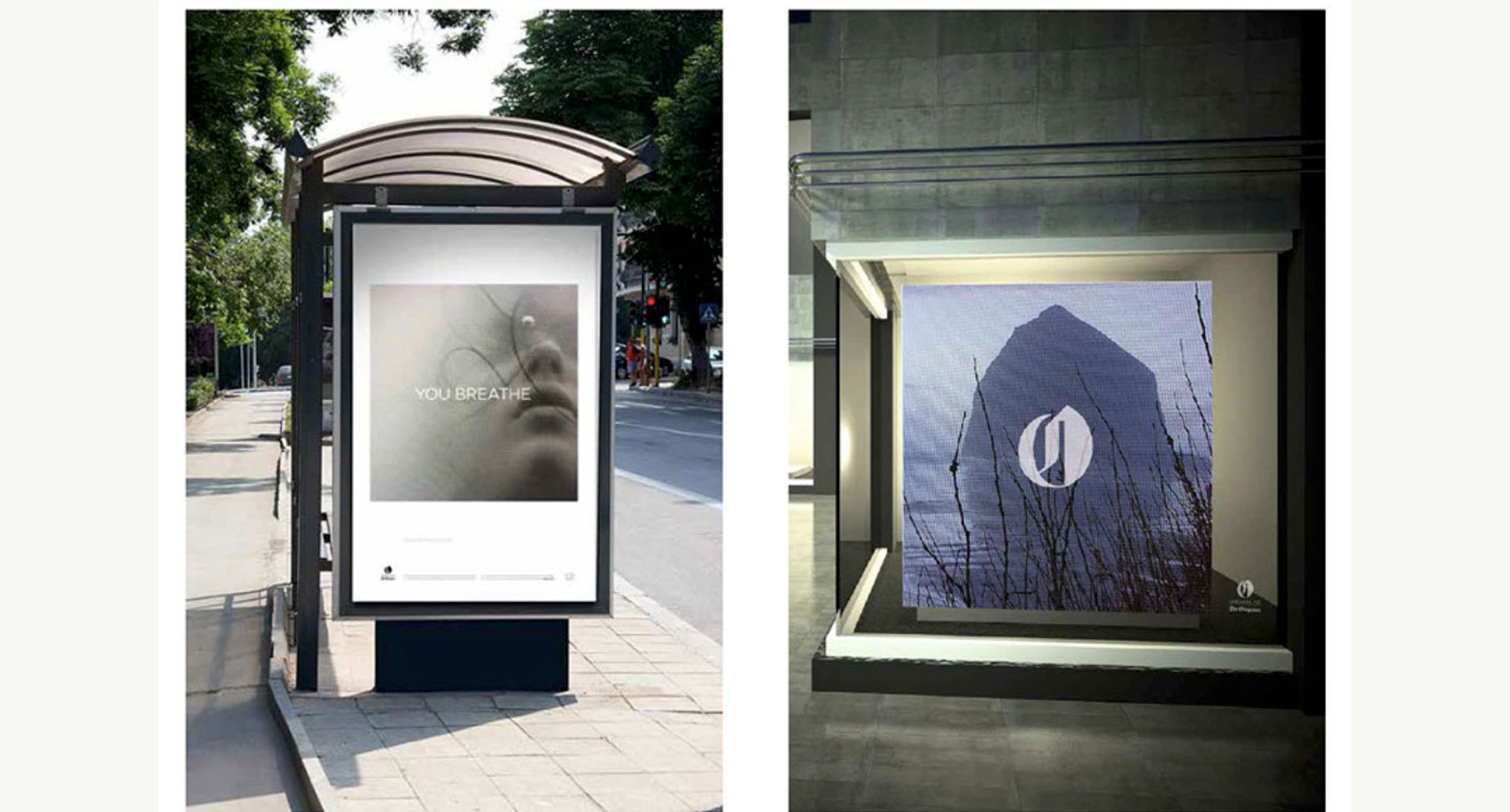Two urban advertising displays with artistic images.