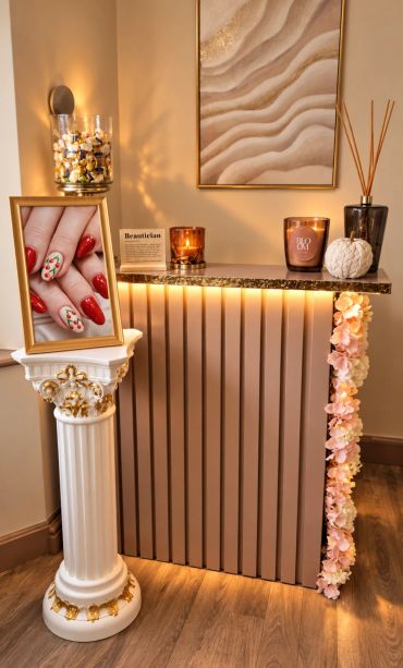 Elegant nail salon setup with floral decor and warm lighting.