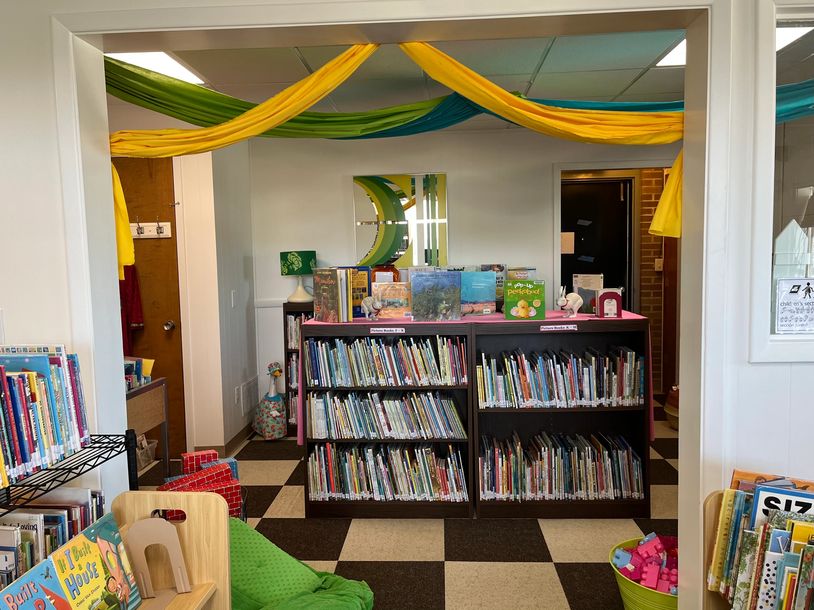 Picture of kids area with book shelves.