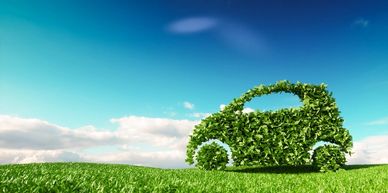 A car made out of leaves, representing eco-travel.