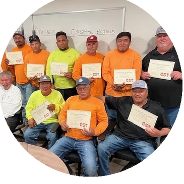 Monroy Construction's team showing their OSHA 30 certificates after attending an OSHA 30 class.