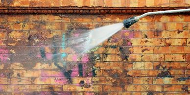 Graffiti removal using pressure cleaning