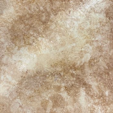 Close-up of a textured beige and light brown surface.
