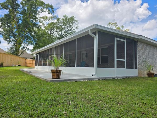 Screen room protecting from bugs and the elements in covington louisiana