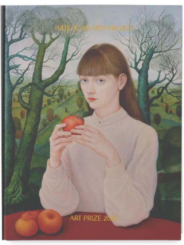 Portrait of a girl holding a red apple with a surreal forest background.