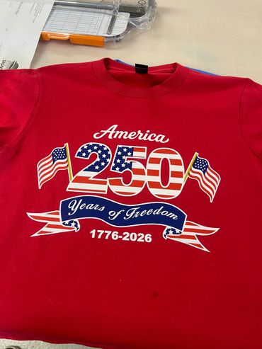 Red shirt celebrating 250 years of American freedom from 1776 to 2026.