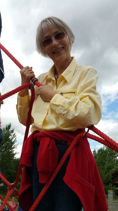 Renate climbing the ropes with the students at our all-school picnic at Cottage Lake Park