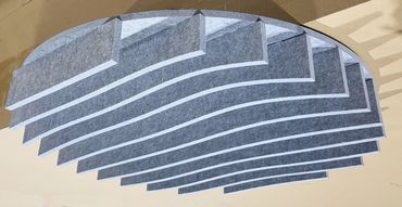 Custom one piece blade baffle to absorb noise in a commercial environment