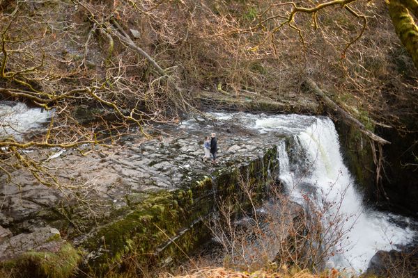 A Montana photographer photographs a young couple in Wales above a waterfall