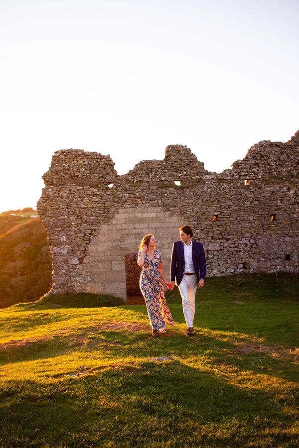 Swansea Wales Wedding photographer photographs engagement photo-style photos of a couple at Pennard 