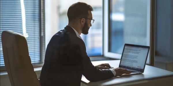 Man working at a laptop computer