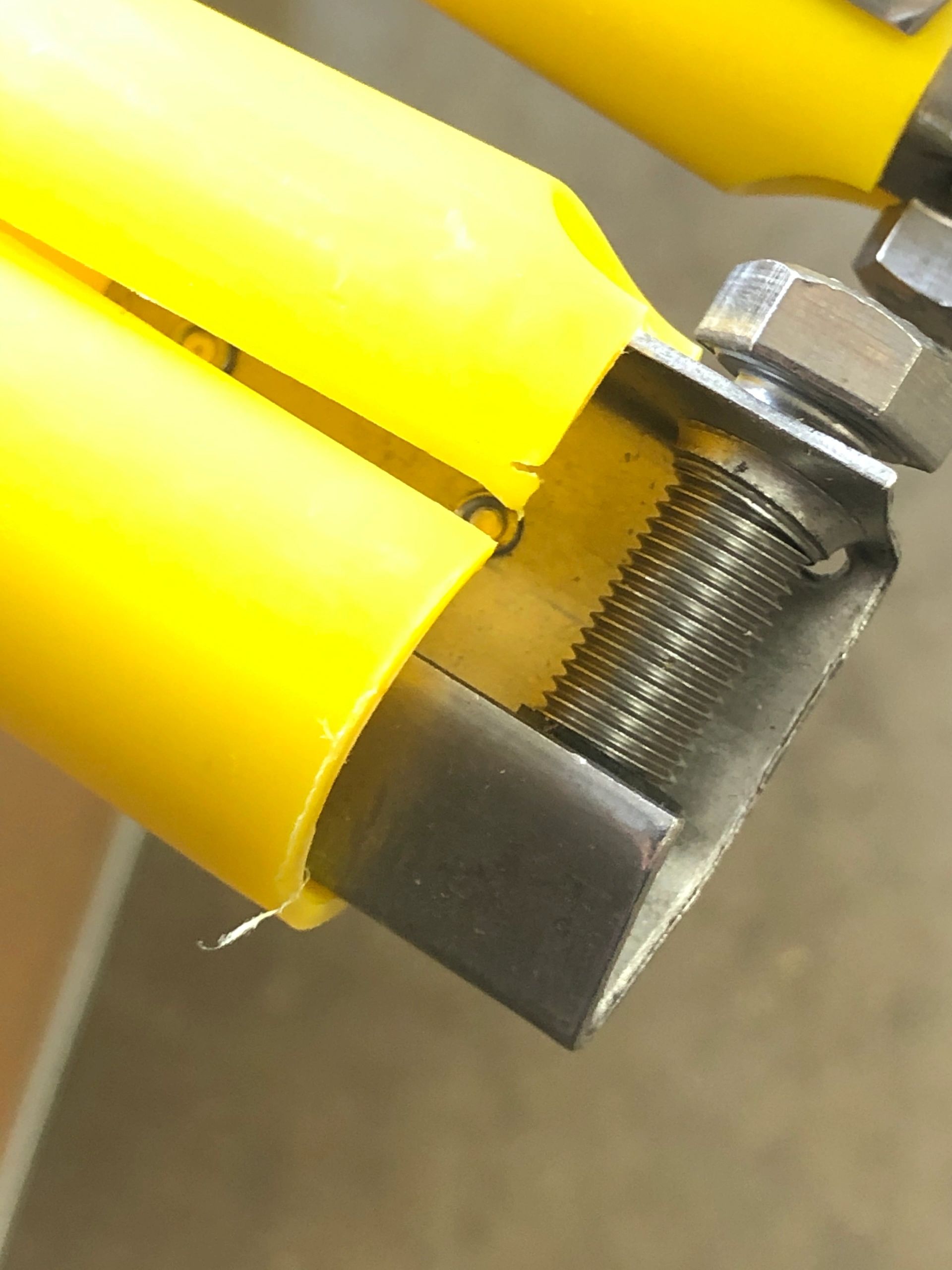 detail of guy line marker with steel bolt attachment