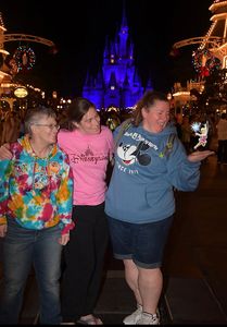 My mom and sister with me at Disney World