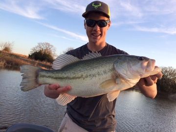 Brandon Heath Overton with a nice Northern Largemouth Bass.  Overton Fisheries Lake & Pond Stocking