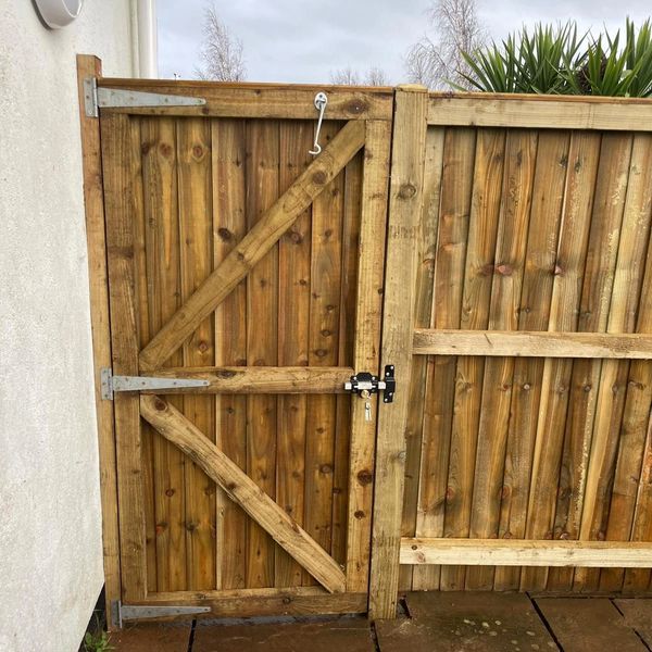wooden gate built and installed.