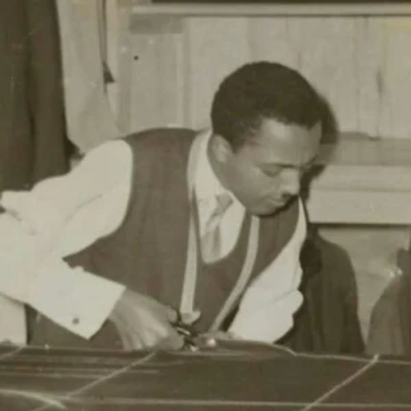 My father Tesfaye Asfaw working on the initial stages of creating the suit by shaping the fabric.